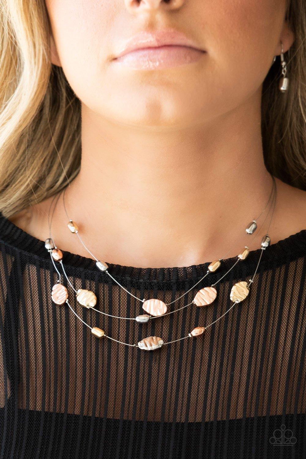 Paparazzi Accessories Top ZEN ~Multi Featuring smooth and delicately hammered finishes, mismatched shiny copper, gold, and silver beads are threaded along dainty silver wire, creating floating layers below the collar. Features an adjustable clasp closure.