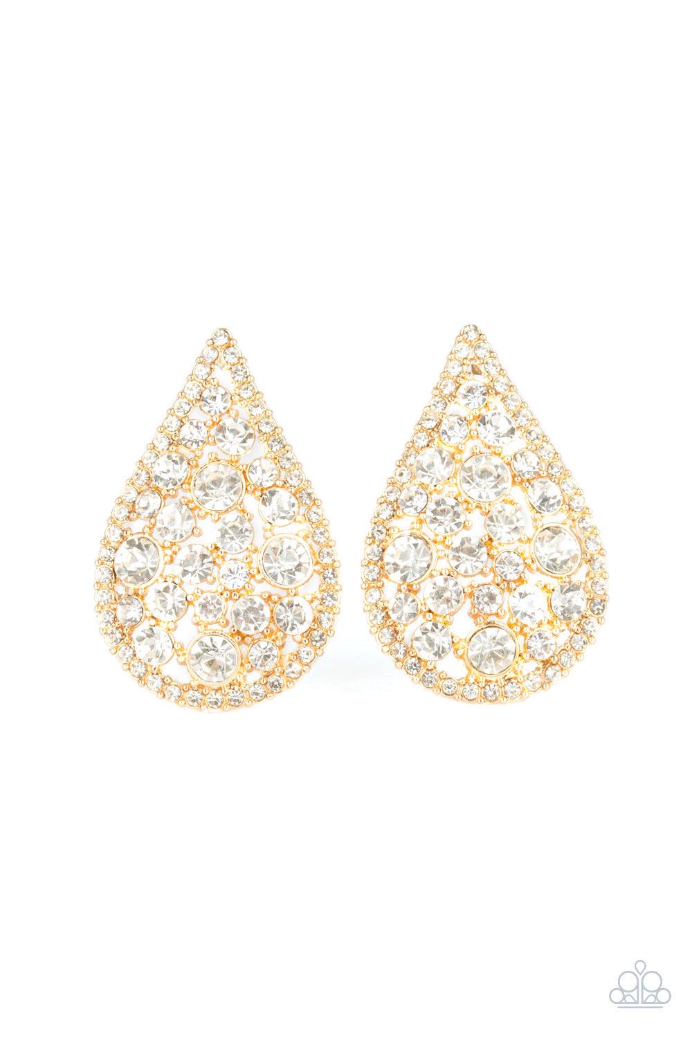 Paparazzi Accessories REIGN Storm - Gold Radiating with glassy white rhinestones, oversized gold teardrops adorn the ear for a dramatic flair. Earring attaches to a standard post fitting. Jewelry