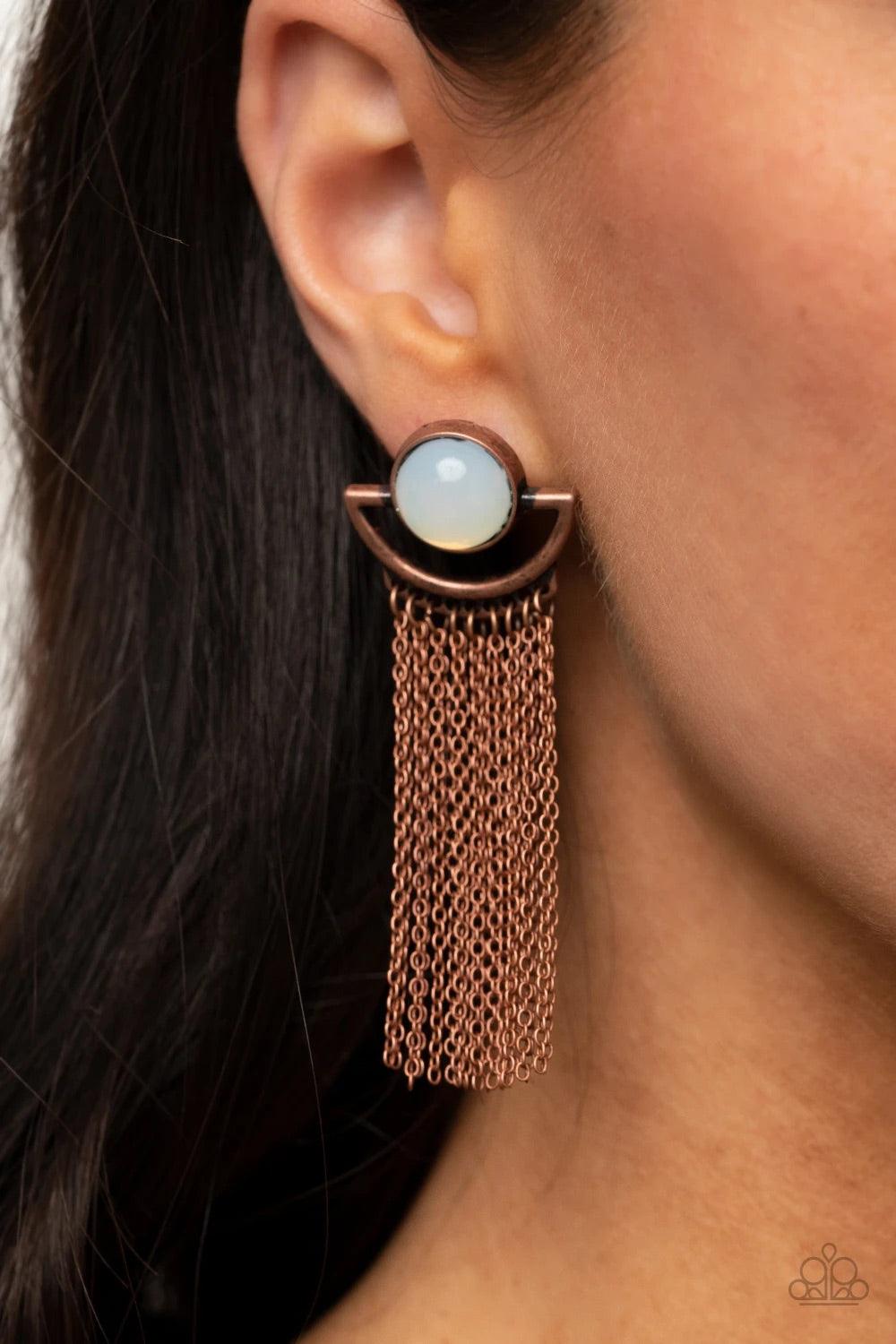 Paparazzi Accessories Opal Oracle - Copper A curtain of dainty copper chains stream from the bottom of a rustic crescent shaped copper frame that is dotted in a dewy opal bead for a mystical finish. Earring attaches to a standard post fitting. Sold as one