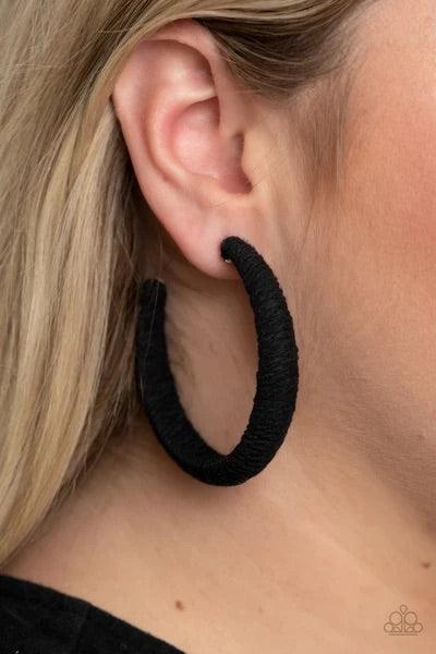 Paparazzi Accessories TWINE And Dine - Black Earthy black twine-like cording is wrapped around a thick hoop, creating a colorful rustic display. Earring attaches to a standard post fitting. Hoop measures approximately 2 1/4" in diameter. Sold as one pair