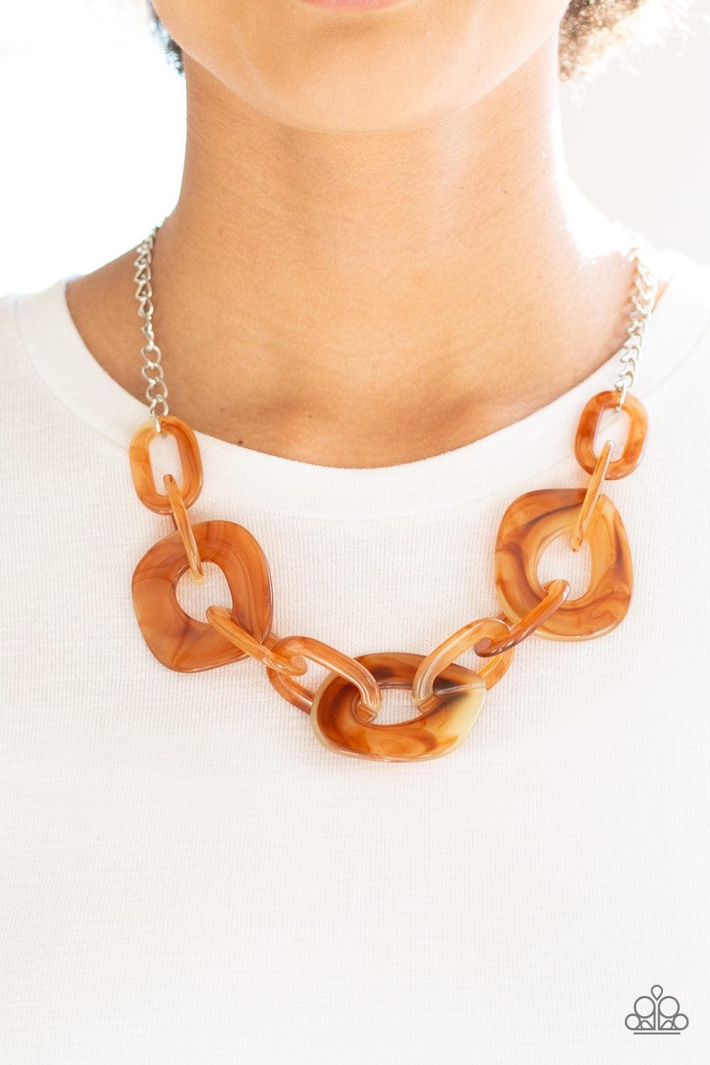Paparazzi Accessories Courageously Chromatic - Brown Brushed in a faux-marble finish, bold brown links connect below the collar for a statement making look. Features an adjustable clasp closure. Jewelry