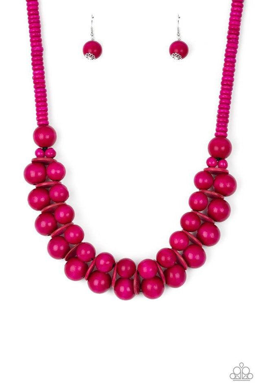 Paparazzi Accessories Caribbean Cover Girl - Pink Brushed in a distressed finish, vivacious pink wooden beads and discs join below the collar for a summery look. Features a button loop closure. Jewelry