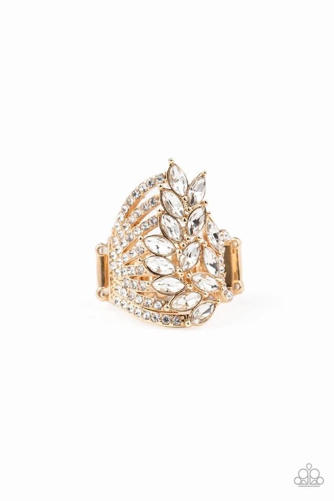 Paparazzi Accessories Clear-Cut Cascade - Gold Attached to white rhinestone encrusted gold bands, a cascade of white marquise cut rhinestones fans across the finger, coalescing into a gorgeous statement maker. Features a stretchy band for a flexible fit.