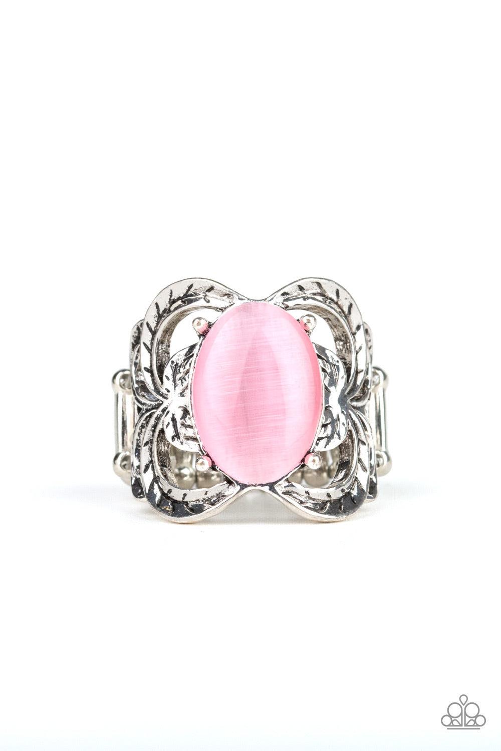 Paparazzi Accessories Go For Glow - Pink A glowing pink cat's eye stone is pressed into the center of a shimmery silver frame etched in leafy details for a whimsical look. Features a stretchy band for a flexible fit. Jewelry