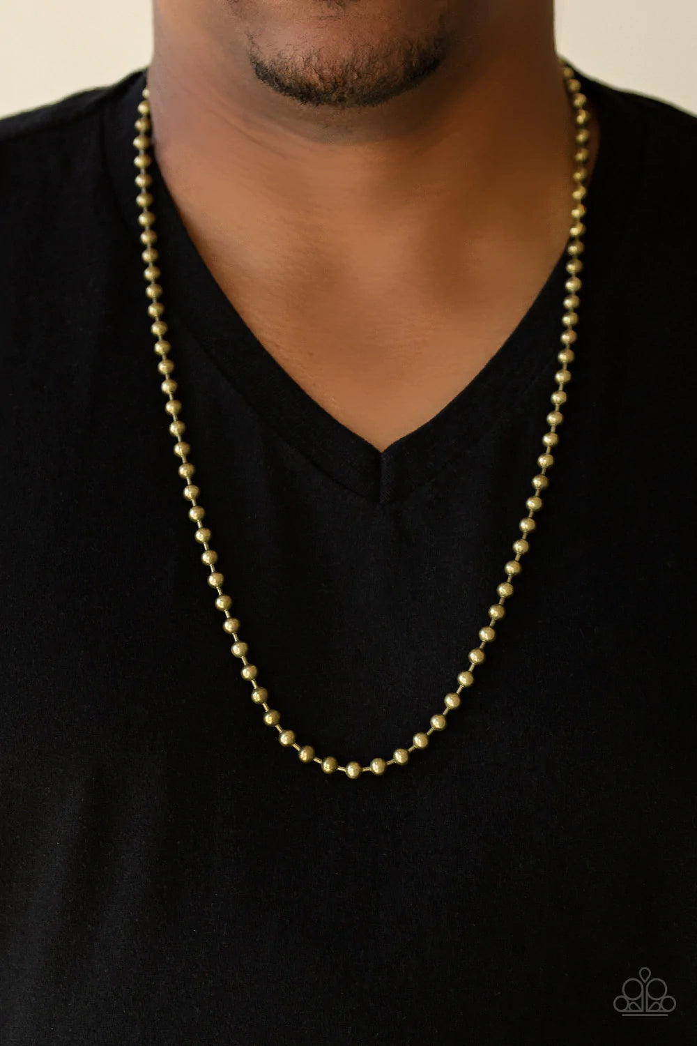 Paparazzi Accessories Mardi Gras Madness - Brass Brushed in an antiqued finish, a classic brass ball chain drapes across the chest for a casual look. Sold as one individual necklace. Necklaces