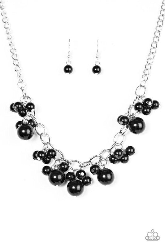 Paparazzi Accessories Celebrity Treatment - Black Clusters of large and small black beads cascade from the bottom of a bold silver chain, creating a refined fringe below the collar. Features an adjustable clasp closure. Sold as one individual necklace. In