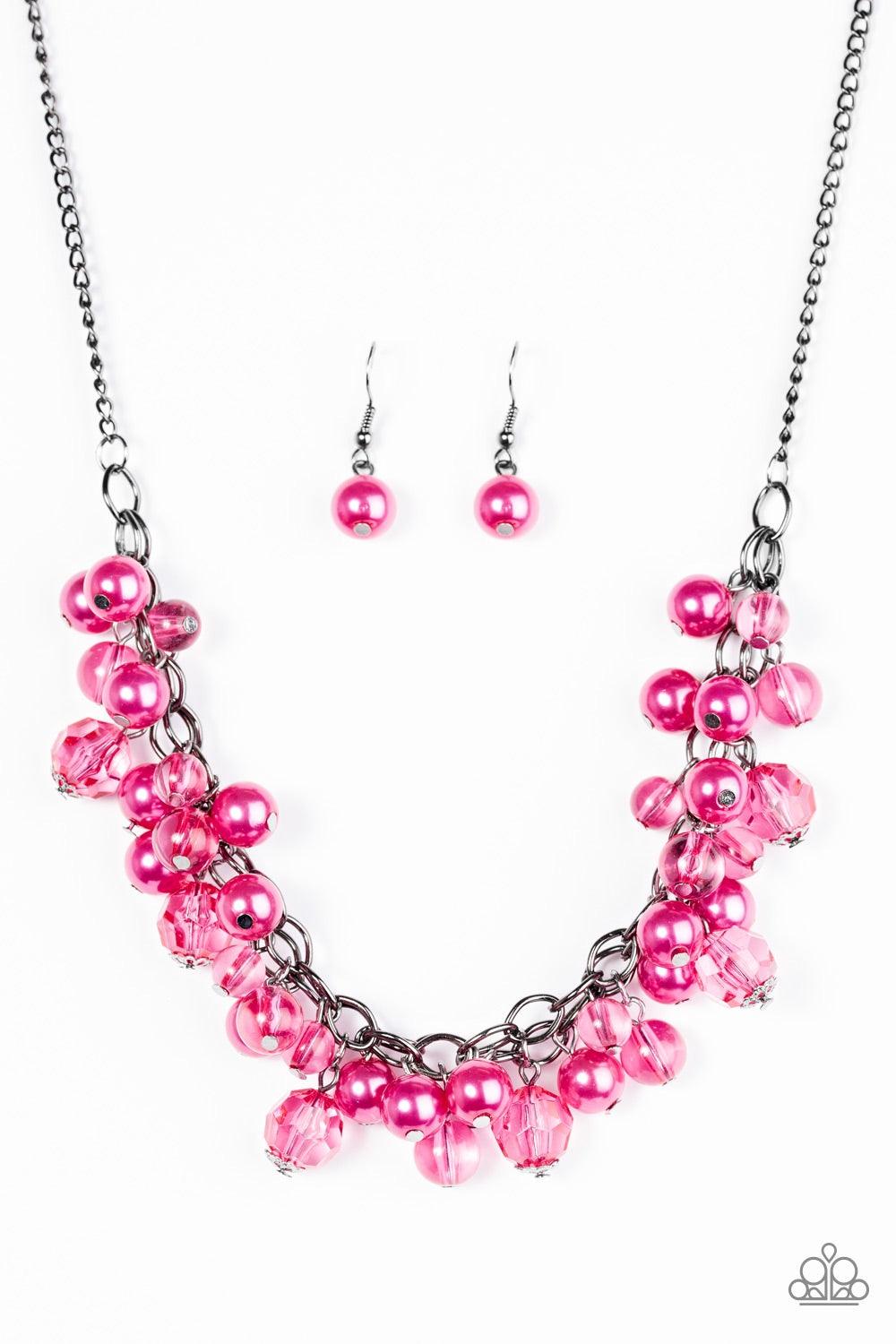 Paparazzi Accessories Time To Runway - Pink Glassy, pearly, and faceted crystal-like beading trickle from the bottom of interlocked gunmetal chains, creating a fierce fringe. Features an adjustable clasp closure. Jewelry