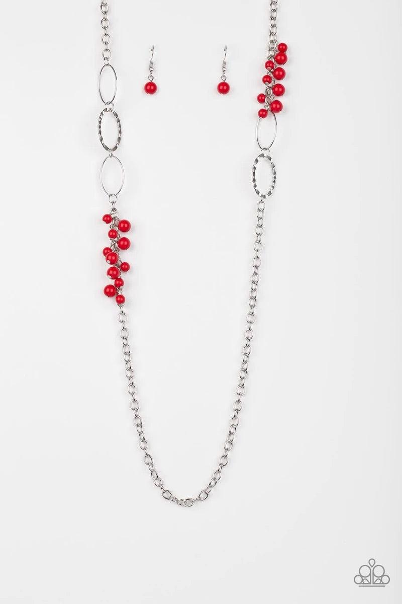 Paparazzi Accessories Flirty Foxtrot - Red Smooth and hammered silver rings join clusters of fiery red beads along a shimmery silver chain for a colorful look. Features an adjustable clasp closure. Sold as one individual necklace. Includes one pair of mat