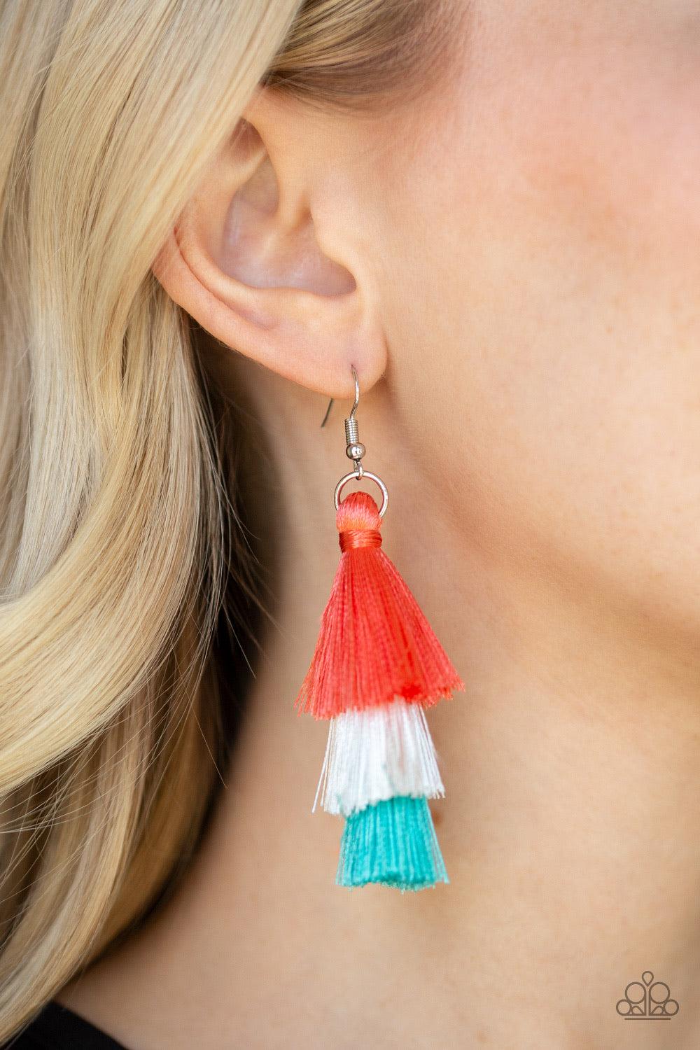 Paparazzi Accessories Hold On To Your Tassel! - Orange Featuring coral, white, and blue thread, a 3-tiered tassel swings from the ear for a flirtatious look. Earring attaches to a standard fishhook fitting. Jewelry