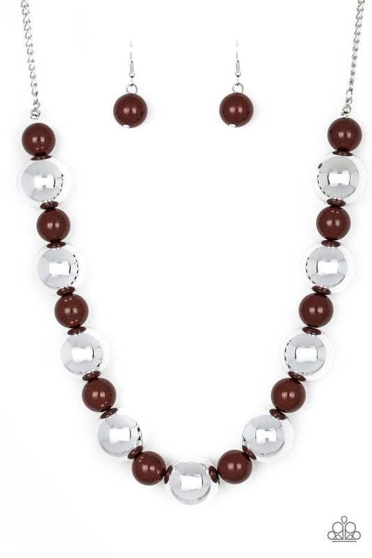 Paparazzi Accessories Top Pop - Brown Polished brown beads and dramatic silver beads drape below the collar for a perfect pop of color. Features an adjustable clasp closure. Jewelry