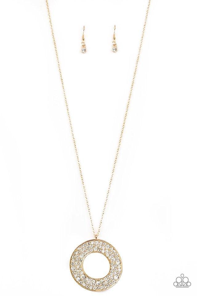 Paparazzi Accessories Bad HEIR Day - Gold Encrusted in row after row of glittery white rhinestones, an oversized round pendant swings from the bottom of a lengthened gold chain for a blinding look. Features an adjustable clasp closure. Jewelry