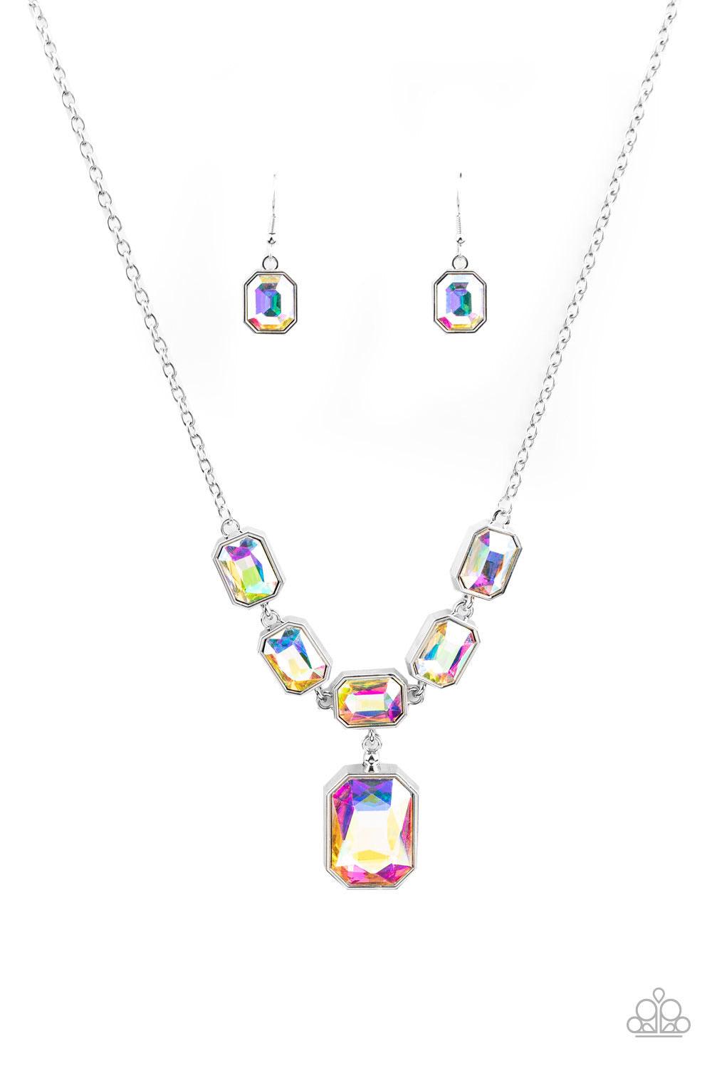 Paparazzi Accessories Million Dollar Moment - Multi Featuring an out-of-this-world iridescence, emerald-cut iridescent gems delicately link below the collar. Attached to a dainty silver chain, the glittering row of rhinestones gives way to a dramatically