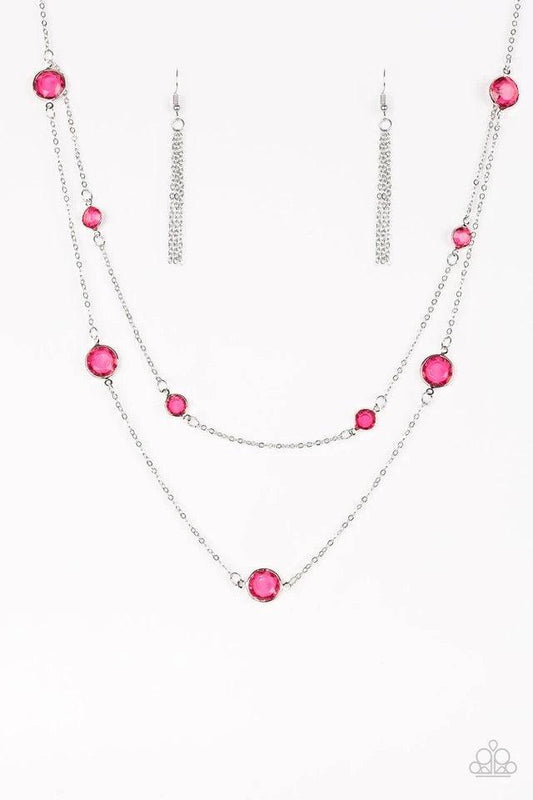 Paparazzi Accessories Raise Your Glass - Pink Varying in size, glassy pink gems trickle along dainty silver chains, creating sparkling layers across the chest. Features an adjustable clasp closure. Jewelry