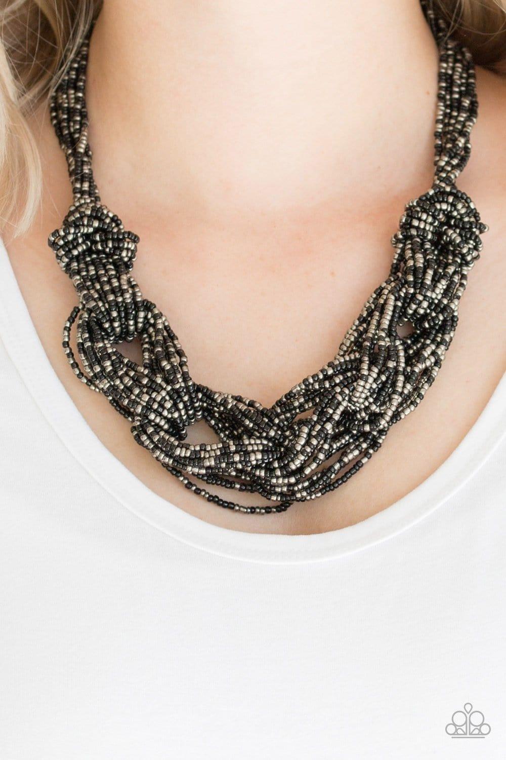 Paparazzi Accessories City Catwalk - Black Brushed in a flashy finish, countless strands of black and gunmetal seed beads weave into a bulky square braid below the collar for a glamorous look. Features an adjustable clasp closure. Sold as one individual n