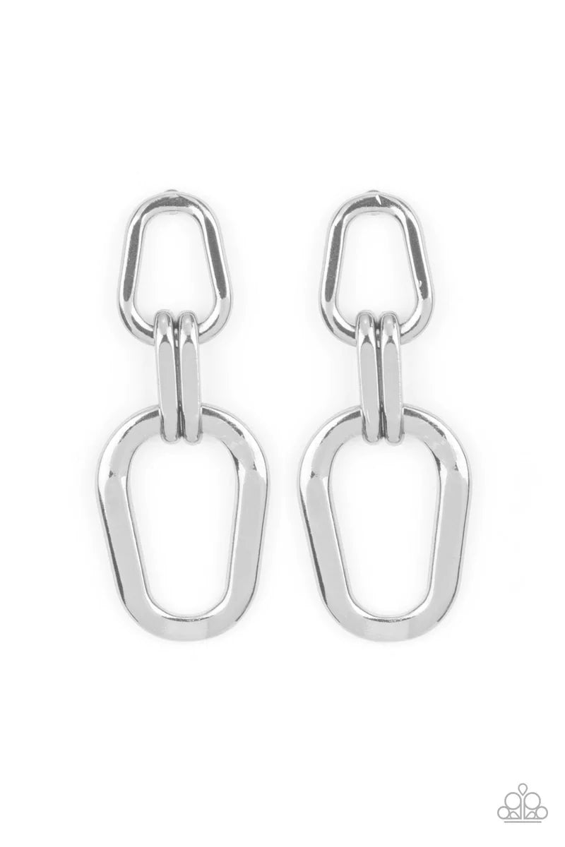 Paparazzi Accessories Harmonic Hardware - Silver A collection of asymmetrical silver oval frames boldly link into an edgy lure, resulting in an intense industrial statement piece. Earring attaches to a standard post fitting. Sold as one pair of post earri