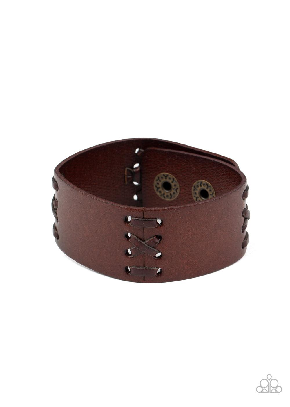 Paparazzi Accessories Batters Up - Brown Sections of leather cording are stitched through a thick brown leather band, creating a rustic look around the wrist. Features an adjustable snap closure. Sold as one individual bracelet. Jewelry