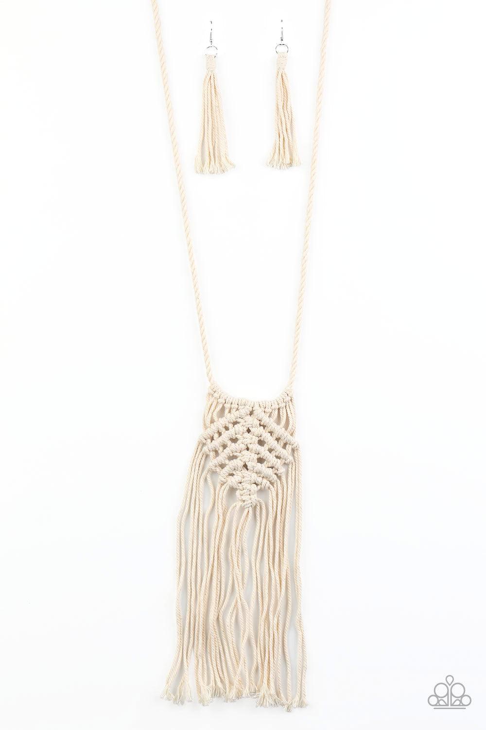 Paparazzi Accessories Macrame Mantra - White Soft twine-like cording decoratively knots into a macramé inspired pendant at the bottom of lengthened strands of twisted cording. Featuring frayed ends, excess cording streams from the bottom of the knotted ce