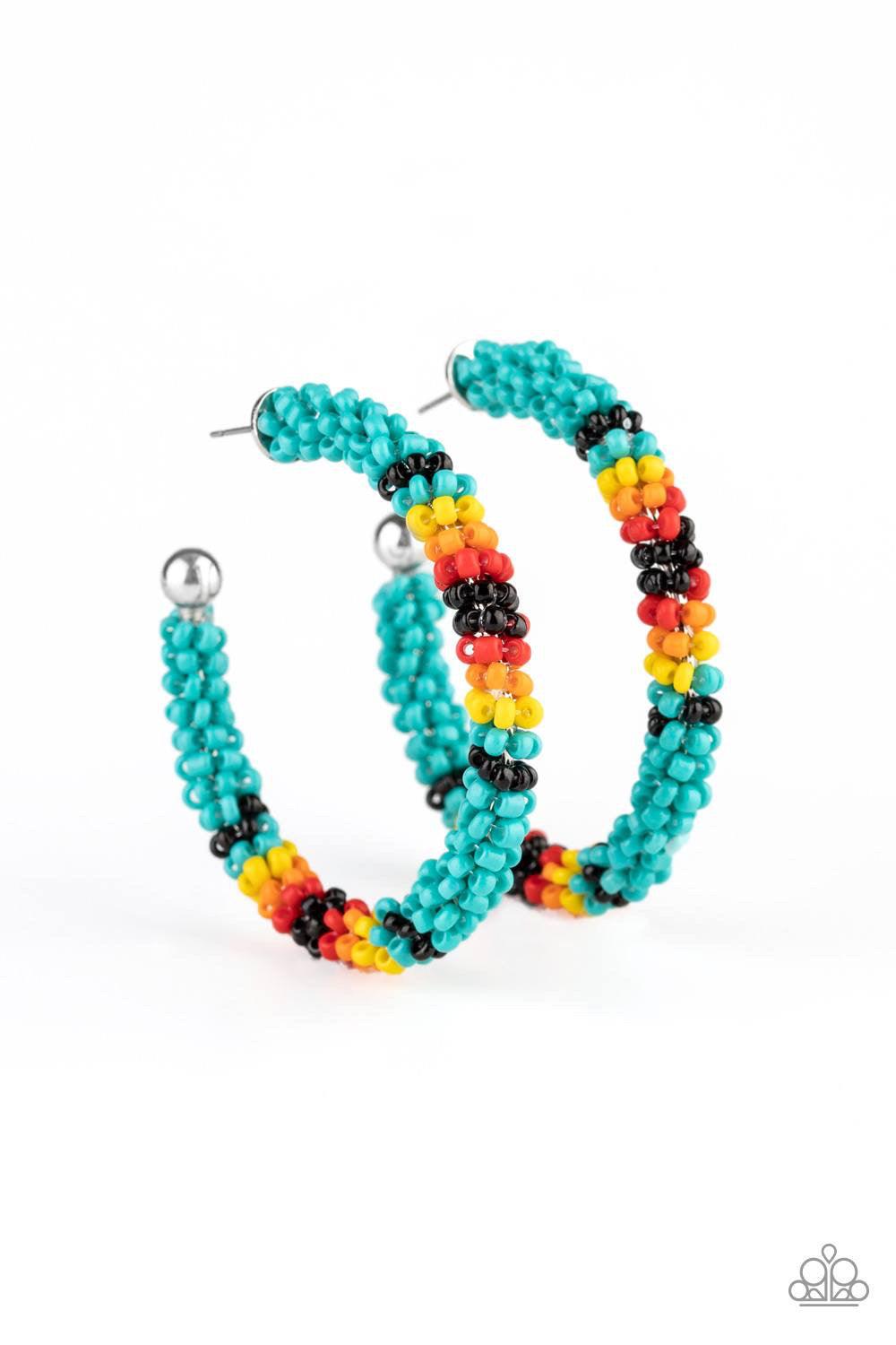 Paparazzi Accessories Bodaciosuly Beaded - Blue A colorful strand of blue, black, yellow, orange, and red seed beads wraps around a shiny silver hoop, creating a colorfully seasonal look. Earring attaches to a standard post fitting. Hoop measures approxim