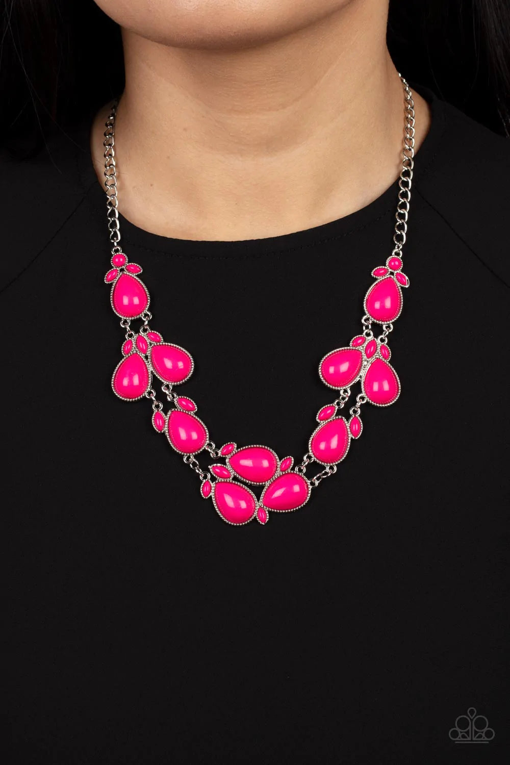 Paparazzi Accessories Botanical Banquet - Pink A flamboyant collection of bubbly pink round, teardrop, and marquise beads cluster in leafy frames below the collar for a flauntable pop of color. Features an adjustable clasp closure. Sold as one individual