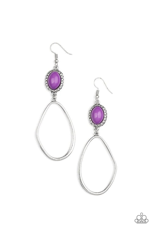 Paparazzi Accessories Adventurous Allure - Purple An asymmetrical silver oval swings from the bottom of a purple beaded silver frame featuring hammered textures, creating a colorfully rustic lure. Earring attaches to a standard fishhook fitting. Sold as o