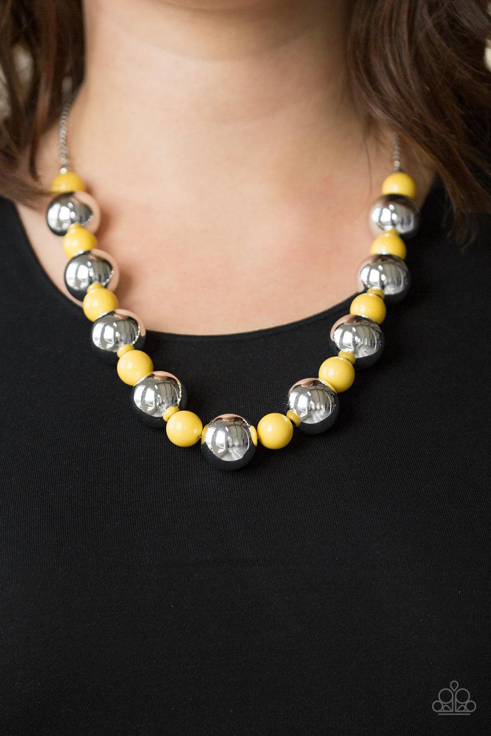 Paparazzi Accessories Top Pop - Yellow Polished yellow beads and dramatic silver beads drape below the collar for a perfect pop of color. Features an adjustable clasp closure. Jewelry
