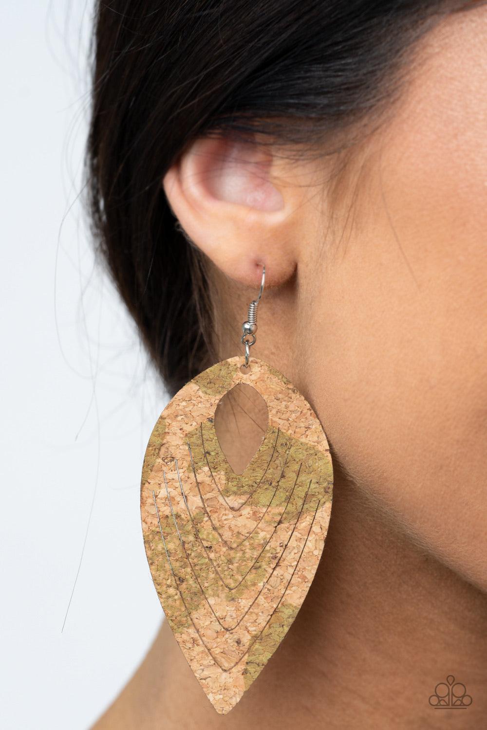 Paparazzi Accessories Cork Cabana - Green Spotted in rustic Military Olive accents, a flat cork teardrop is spliced into a rippling frame for an earthy fashion. Earring attaches to a standard fishhook fitting. Sold as one pair of earrings. Jewelry