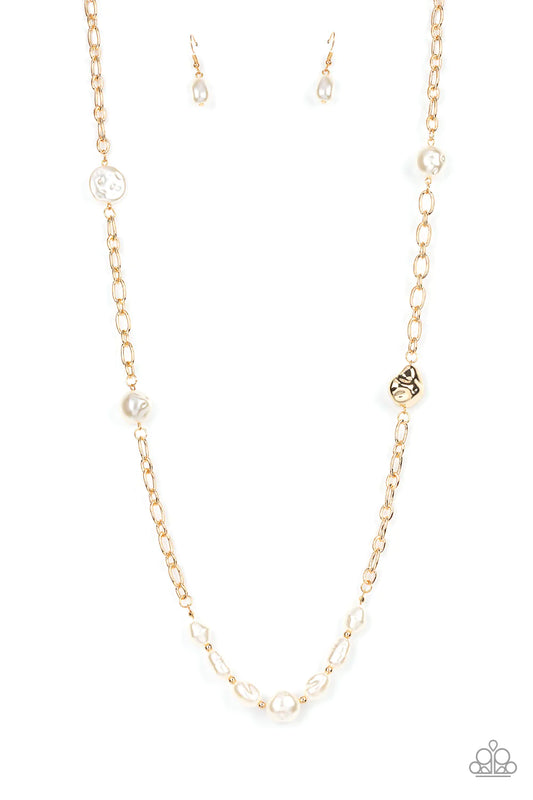 Paparazzi Accessories Pardon My FABULOUS - Gold Infused with dainty gold beads, an elegant collection of imperfect white pearls and gold beads asymmetrically adorn a substantial gold chain across the chest for an effortless elegance. Features an adjustabl
