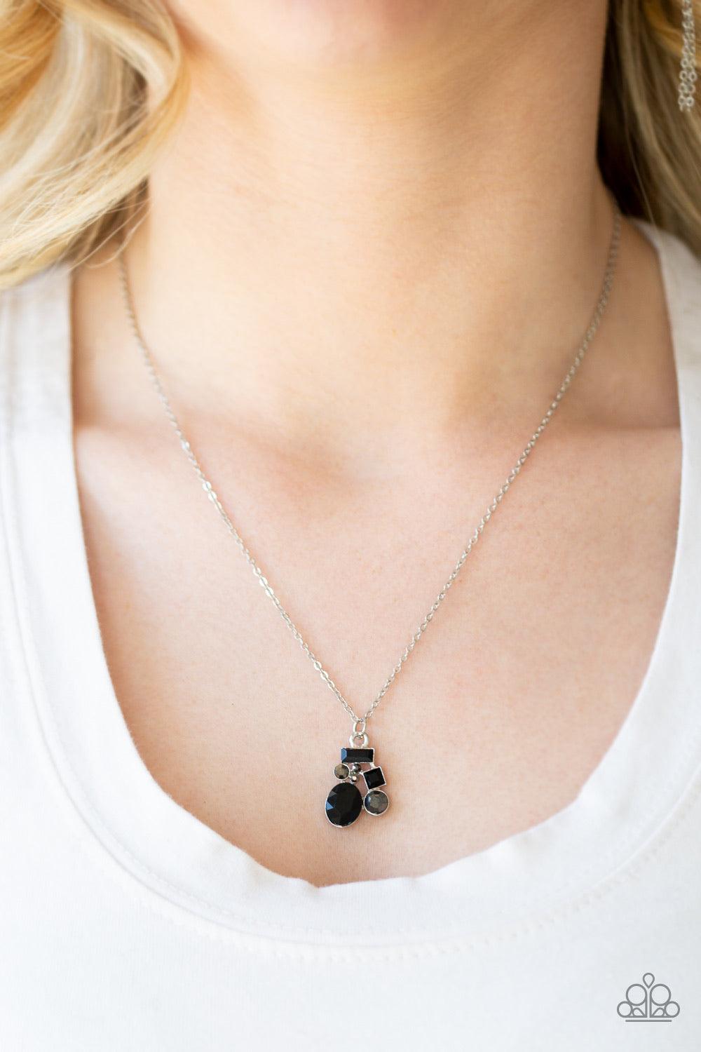 Paparazzi Accessories Time To Be Timeless - Black Varying in shape and size, glittery black and hematite rhinestones coalesce into a sparkling pendant below the collar for a timeless look. Features an adjustable clasp closure. Sold as one individual neckl