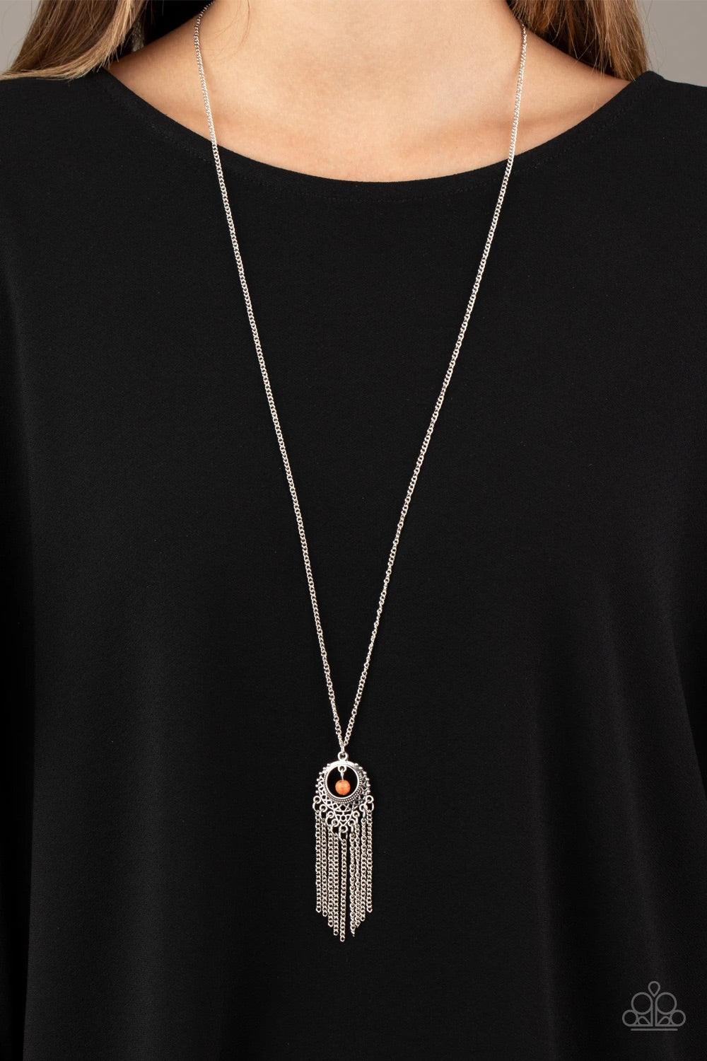 Paparazzi Accessories Western Weather - Orange A vivacious orange stone bead swings from the top of an ornate silver frame. Infused with a tapered tassel, the whimsical pendant swings from the bottom of an elongated silver chain for a wanderlust finish. F