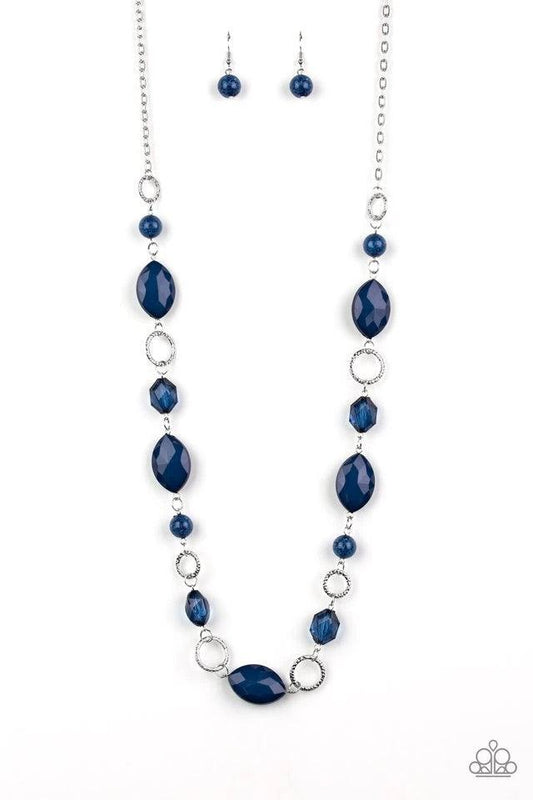 Paparazzi Accessories Shimmer Simmer - Blue A collection of faceted, crystal-like, and sparkling blue beads join across the chest. Hammered silver rings are sprinkled between the colorful accents for a whimsical finish. Features an adjustable clasp closur