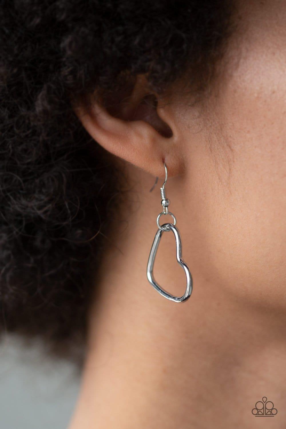 Paparazzi Accessories Unbreak My Heart - Silver Airy silver heart silhouettes connect below the collar for a flirtatious look. Features an adjustable clasp closure. Sold as one individual necklace. Includes one pair of matching earrings. Jewelry