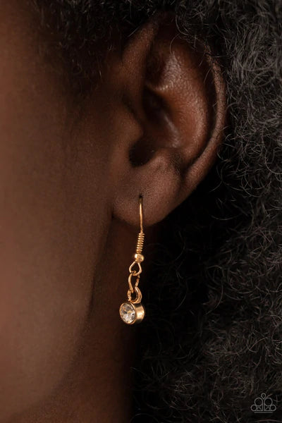 Paparazzi Accessories Fiercely Flowering - Gold Featuring glassy white rhinestone centers, bubbly pearl petaled gold flowers gradually increase in size as they alternate with white rhinestone petaled flowers below the collar for a fierce floral fashion. F