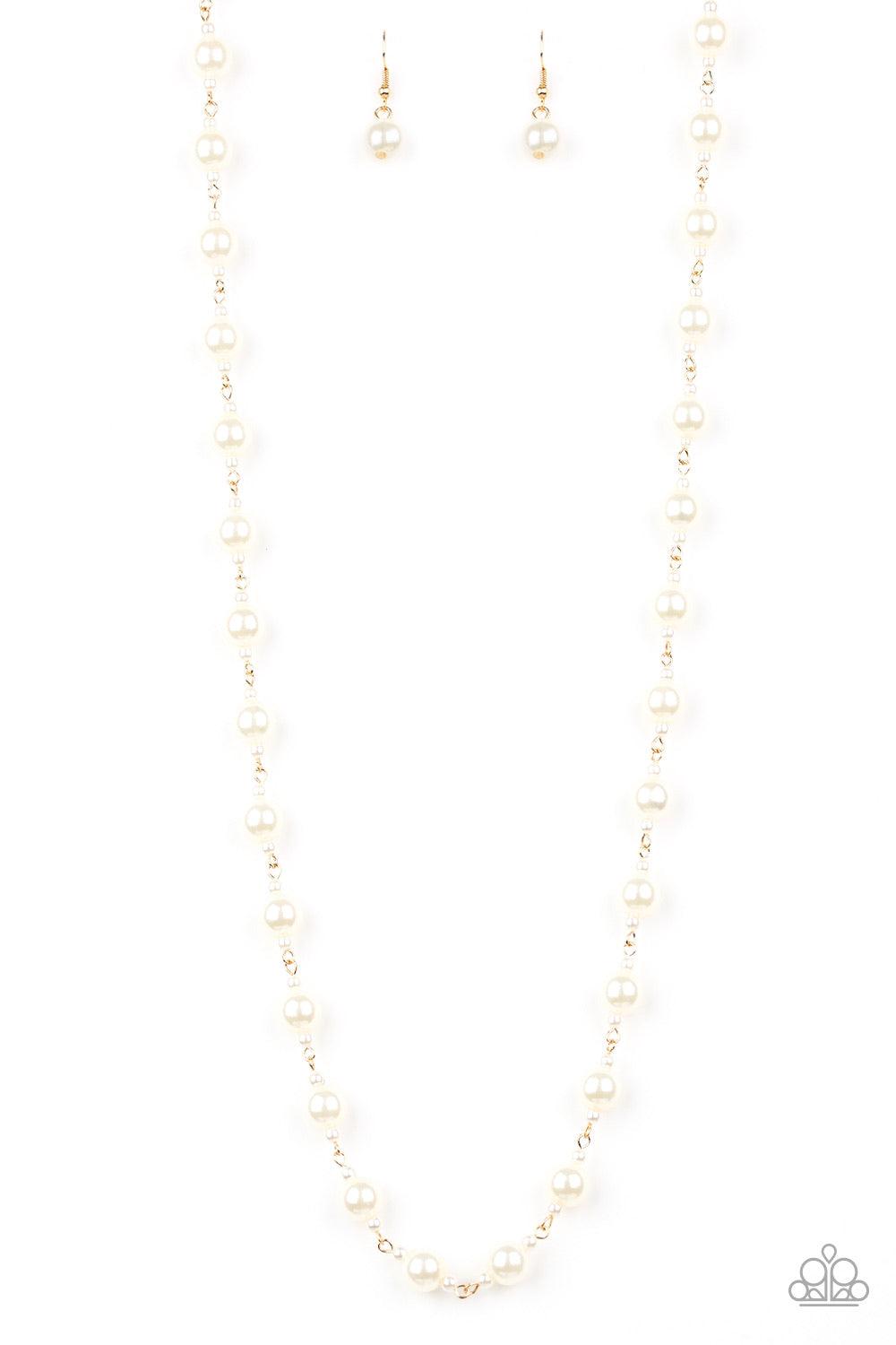Paparazzi Accessories Behind The Scenes - Gold A collection of dainty and classic white pearls link across the chest in a timeless fashion. Features an adjustable clasp closure. Jewelry