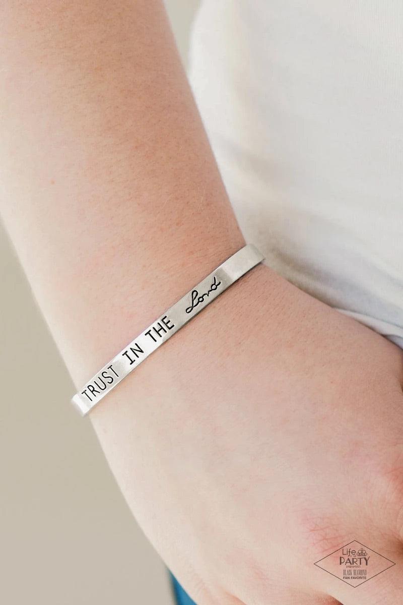 Paparazzi Accessories I Put My Trust In You - Silver A dainty silver cuff is stamped in the phrase "Trust in the Lord" for an inspiring finish. Sold as one individual bracelet. Jewelry