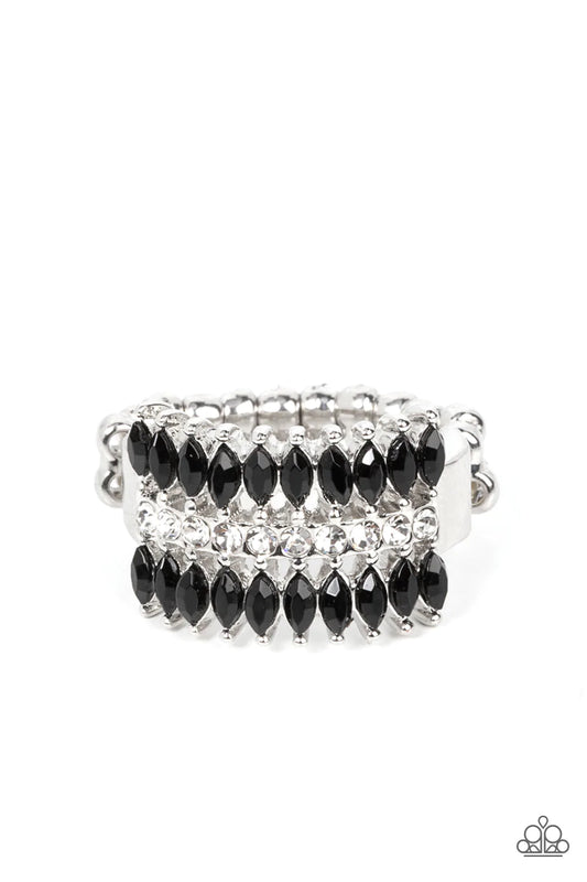 Paparazzi Accessories Cinematic Couture - Black Two rows of marquise shaped black beads are separated by a single row of glassy white rhinestones, layering into a bold pop of sparkle around the finger. Features a stretchy band for a flexible fit. Sold as