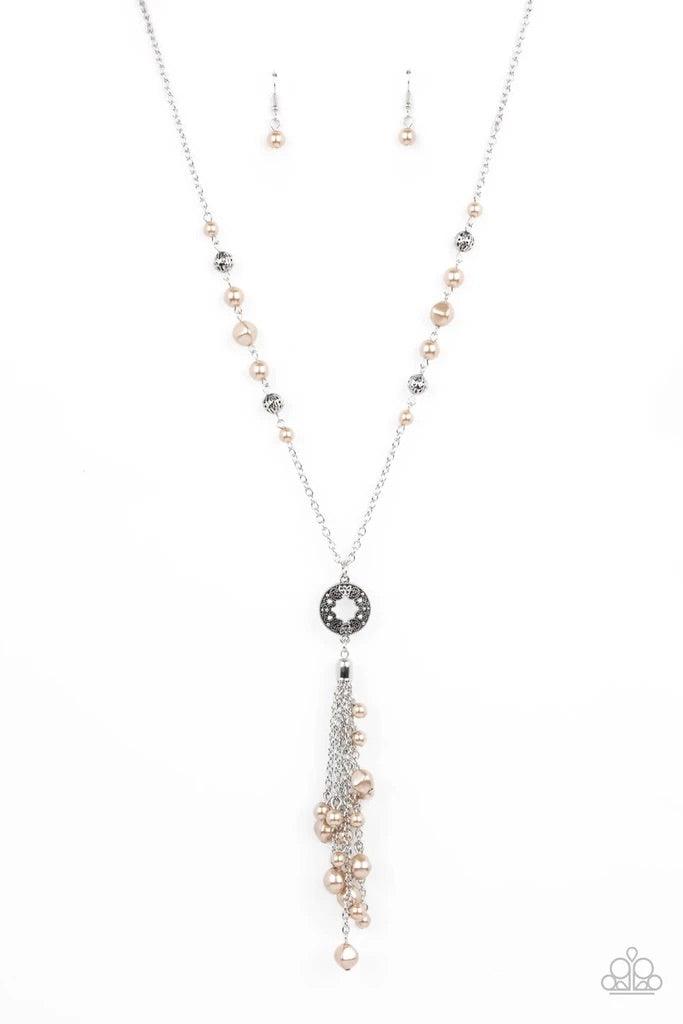 Paparazzi Accessories Tasseled Treasure - Brown Dotted with sections of ornate silver beads and imperfect brown pearls, a lengthened silver chain gives way to a filigree studded pendant. Dotted with matching pearls, shiny silver chains join into a timeles