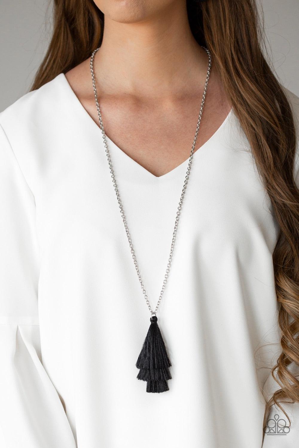 Paparazzi Accessories Triple The Tassel - Black Featuring shimmery black thread, a 3-tiered tassel swings from the bottom of a lengthened silver chain for a colorful, wanderlust vibe. Features an adjustable clasp closure. Jewelry
