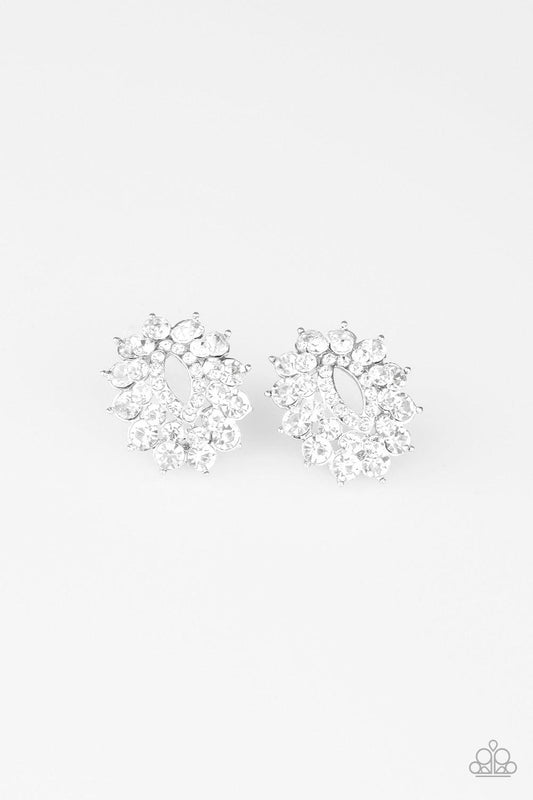 Paparazzi Accessories Brighten The Moment - White Varying in size, three stacks of glittery white rhinestones fan out from an airy center, coalescing into a stellar frame. Earring attaches to a standard post fitting. Jewelry