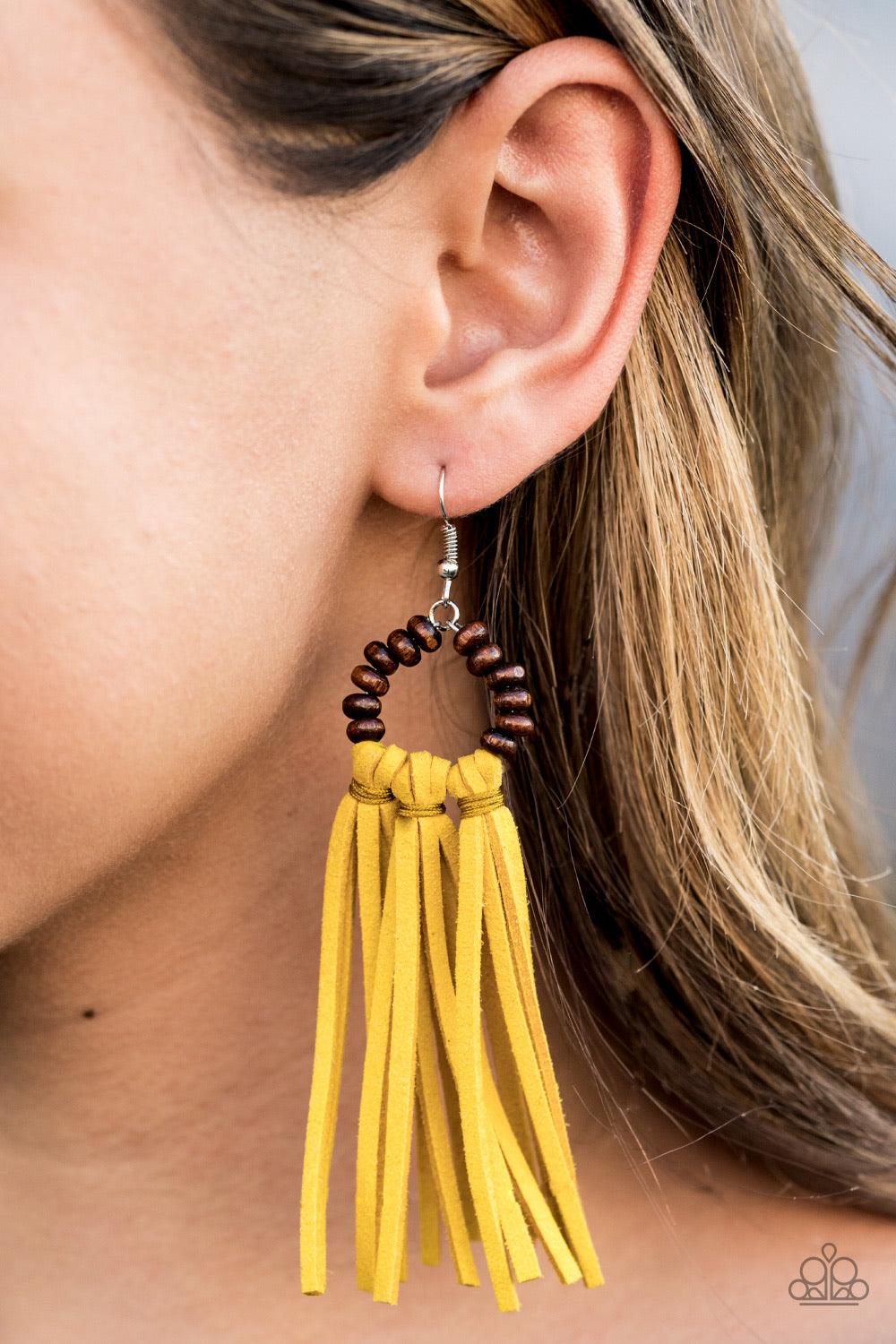 Paparazzi Accessories Easy To PerSUEDE - Yellow A trio of yellow suede tassels are knotted in place at the bottom of a wooden beaded frame, creating an earthy fringe. Earring attaches to a standard fishhook fitting. Jewelry