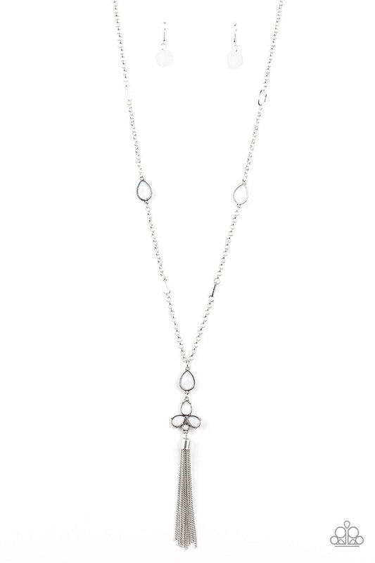 Paparazzi Accessories Eden Dew - White A cluster of dewy white teardrop beads coalesces at the bottom of a lengthened silver chain. Matching beads embedded in airy silver frames dot the chains that climb the chest, bringing an extra pop of color to the wh