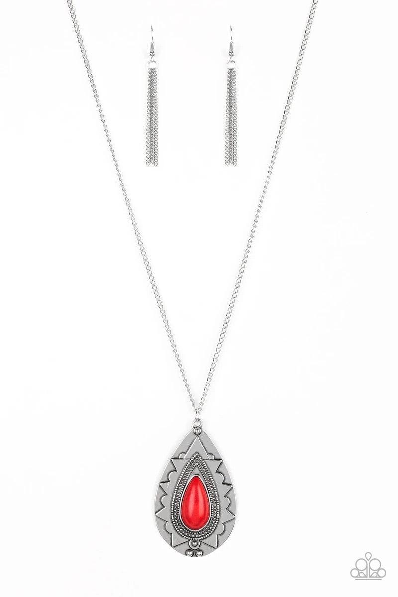 Paparazzi Accessories Sedona Solistice - Red Chiseled into a tranquil teardrop, a fiery red stone is pressed into an ornate silver frame. The whimsical pendant swings from the bottom of a lengthened silver chain for a seasonal look. Features an adjustable