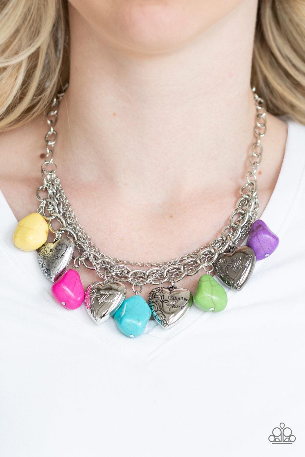 Paparazzi Accessories Change of Heart - Multi Multicolored faux rocks alternate with heart charms along a chunky silver chain. Hearts are inscribed with the phrase "With All My Heart" on one side and a short bible verse on the other that reads, "Love the