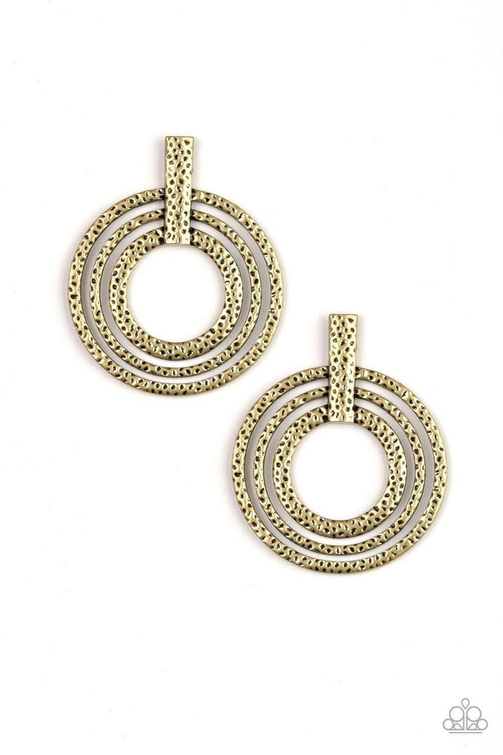 Paparazzi Accessories Ever Elliptical - Brass Delicately hammered in an antiqued shimmer, glistening brass circles attach to a rectangular brass fitting, spiraling into a dizzying frame. Features a standard post fitting. Jewelry