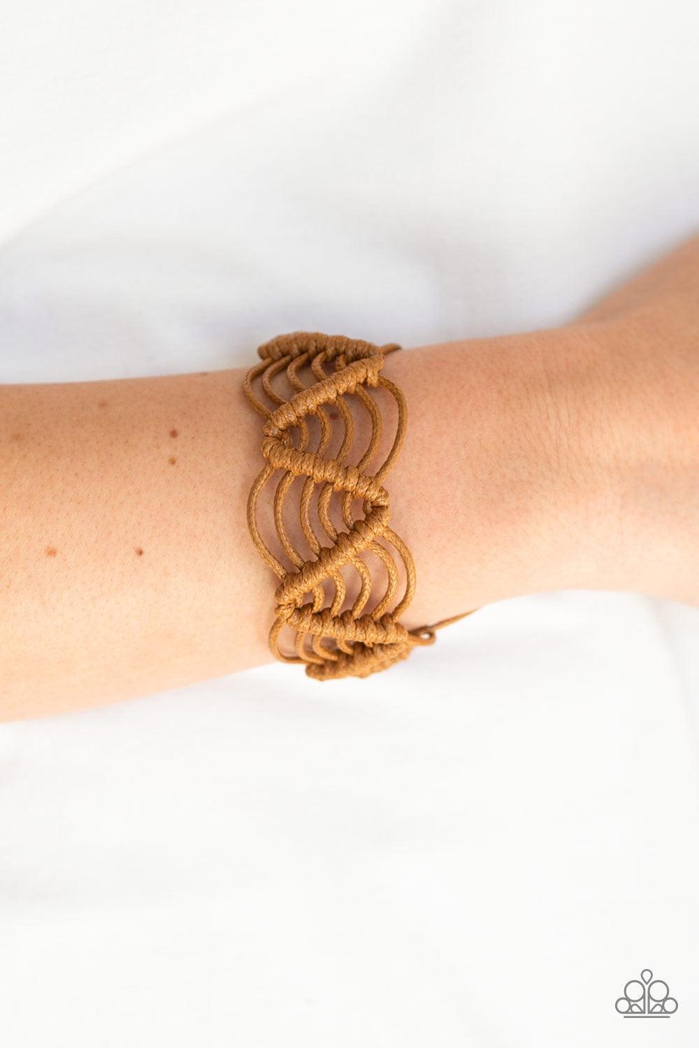 Paparazzi Accessories Rise to the Bait - Brown Brown twine knots around shiny brown cording, creating a netted pattern around the wrist. Features an adjustable sliding knot closure. Jewelry