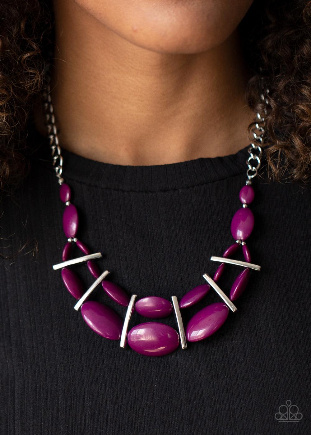 Paparazzi Accessories Law of the Jungle - Purple Sectioned off by edgy silver fittings, a flamboyant collection of vivacious plum beads link into two colorful layers below the collar for a bold pop of color. Features an adjustable clasp closure. Sold as o