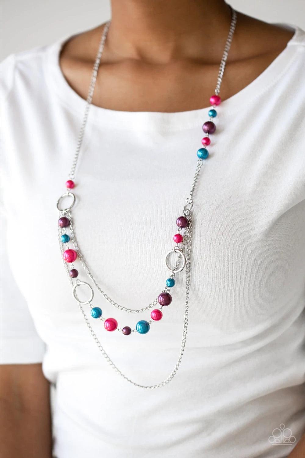 Paparazzi Accessories Party Princess - Multi Pearly blue, pink, and purple beads and shimmery silver hoops trickle along glistening silver chains, creating mismatched layers down the chest. Features an adjustable clasp closure. Jewelry