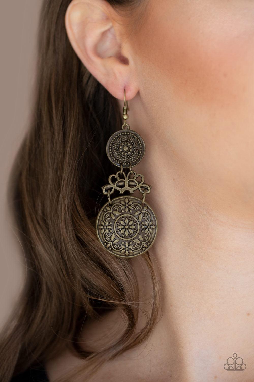 Paparazzi Accessories Garden Adventure - Brass Embossed and studded in antiqued floral patterns, flowery brass discs flank a vine-like brass fitting, coalescing into a whimsical lure. Earring attaches to a standard fishhook fitting. Jewelry