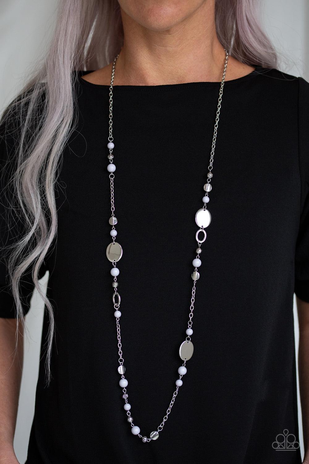 Paparazzi Accessories Serenely Springtime None - Silver An array of polished gray beads, silver discs, and ornate silver accents trickles along a shimmery silver chain for a whimsical look. Features an adjustable clasp closure. Sold as one individual neck