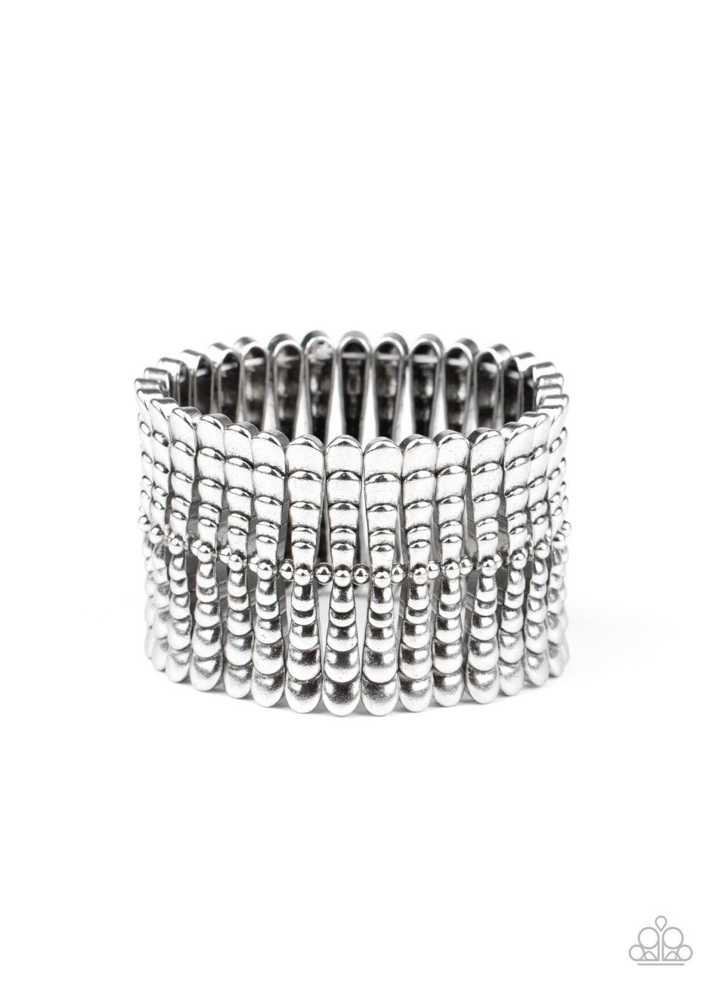 Paparazzi Accessories Level Field - Silver Infused with dainty silver beads, rippling silver bars are threaded along stretchy bands around the wrist, creating a rustic centerpiece. Sold as one individual bracelet. Jewelry