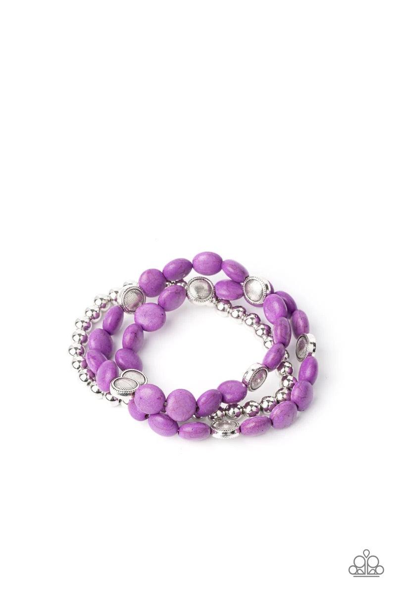 Paparazzi Accessories Desert Verbena - Purple A vivacious collection of purple stone beads, ornate silver accents, and classic silver beads are threaded along stretchy bands around the wrist for a seasonally layered look. Sold as one set of three bracelet